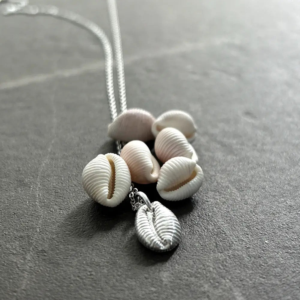 Calary Shell Silver Cowrie Shell Necklace – Calgary Gallery & Gift Shop